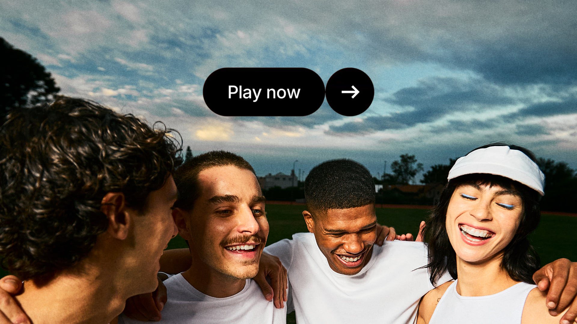 Diverse group of young people smiling together with a 'Play now' button UI overlay
