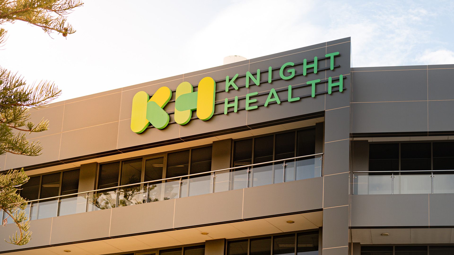 Knight Health building exterior with 'KH Knight Health' signage on the facade