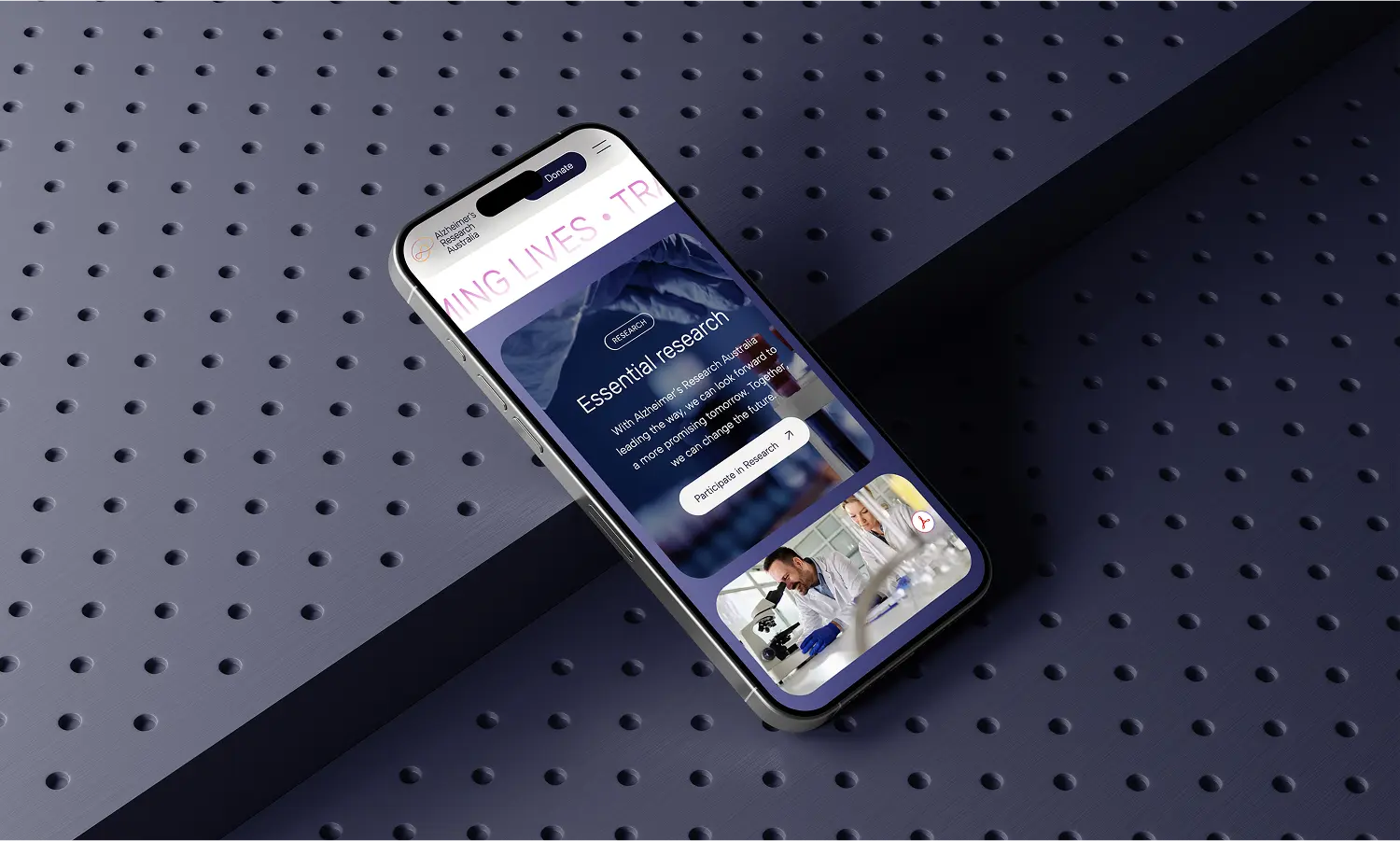 Smartphone displaying the Alzheimer's Research Australia website interface on a dark blue background