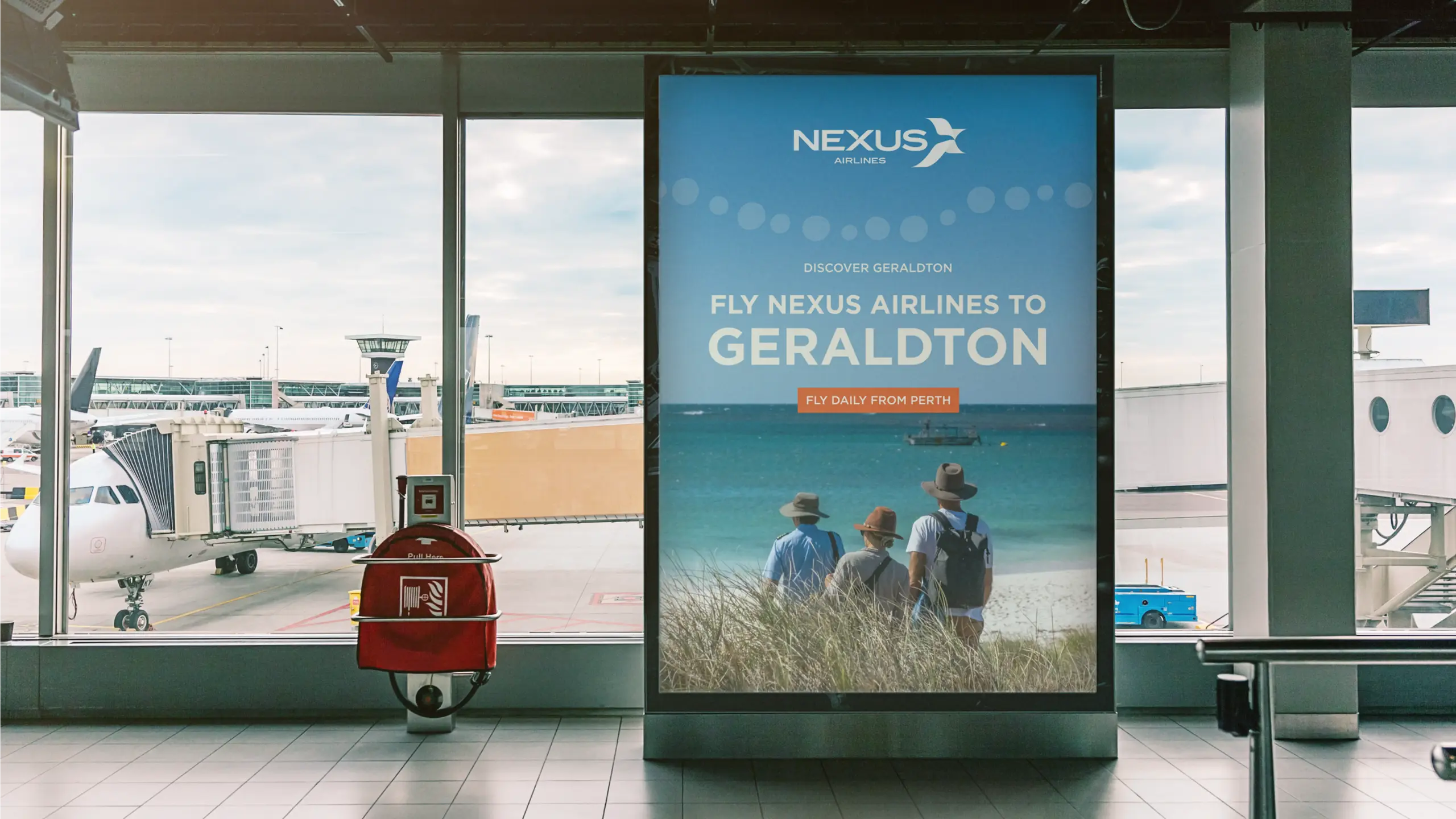 Large-format Nexus Airlines billboard mockup at an airport showing aircraft imagery and 'Fly Nexus Airlines to Geraldton' advertising panels