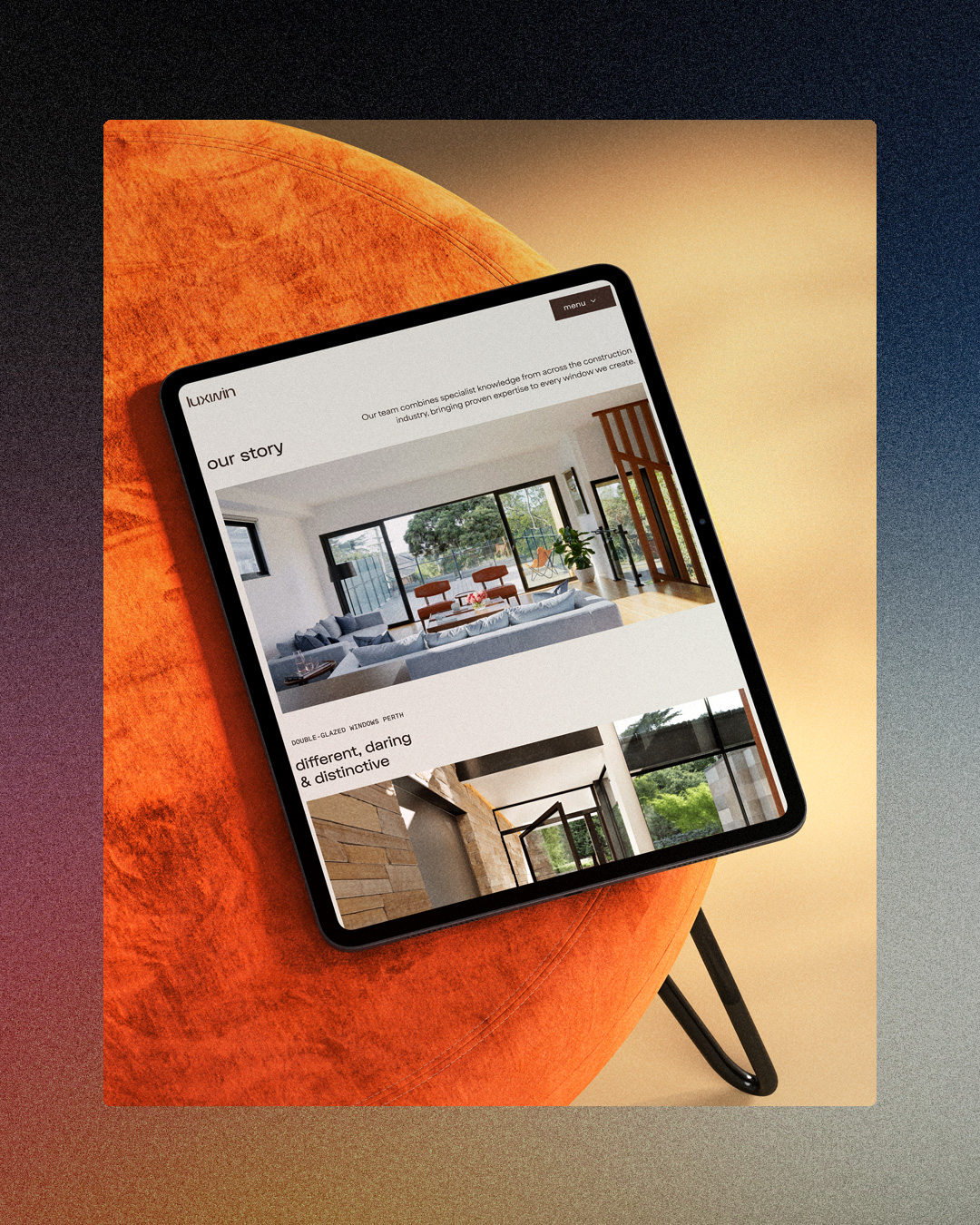 A tablet device showing a website interface on a warm terracotta orange background — Luxwin digital presence