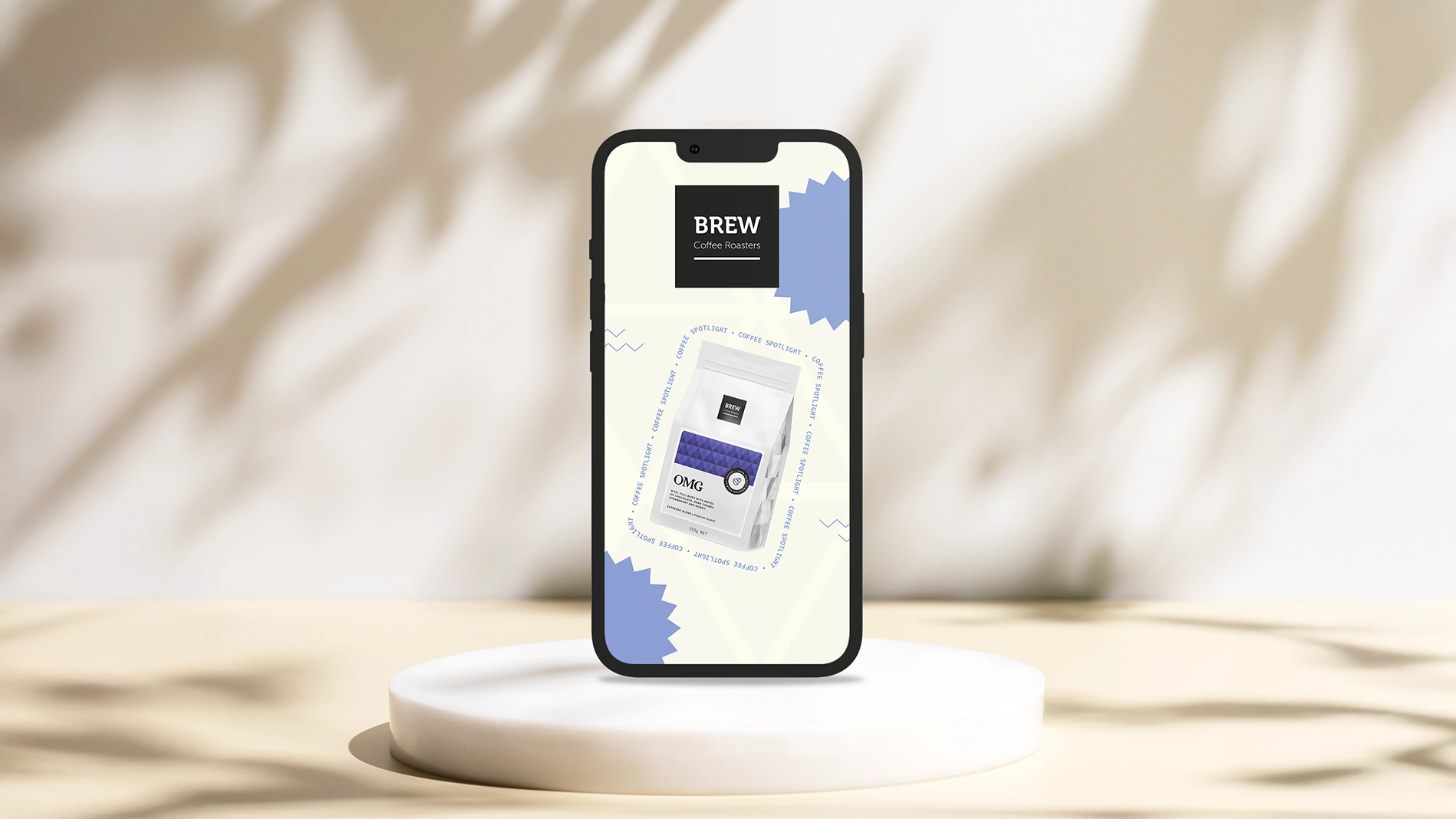A smartphone on a white pedestal displaying the Brew app interface, with soft natural shadows on a warm neutral background