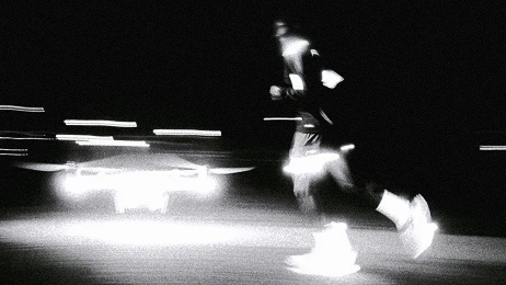 High contrast black and white abstract photograph with motion blur suggesting digital disruption — blog cover image for Spotify AI app article