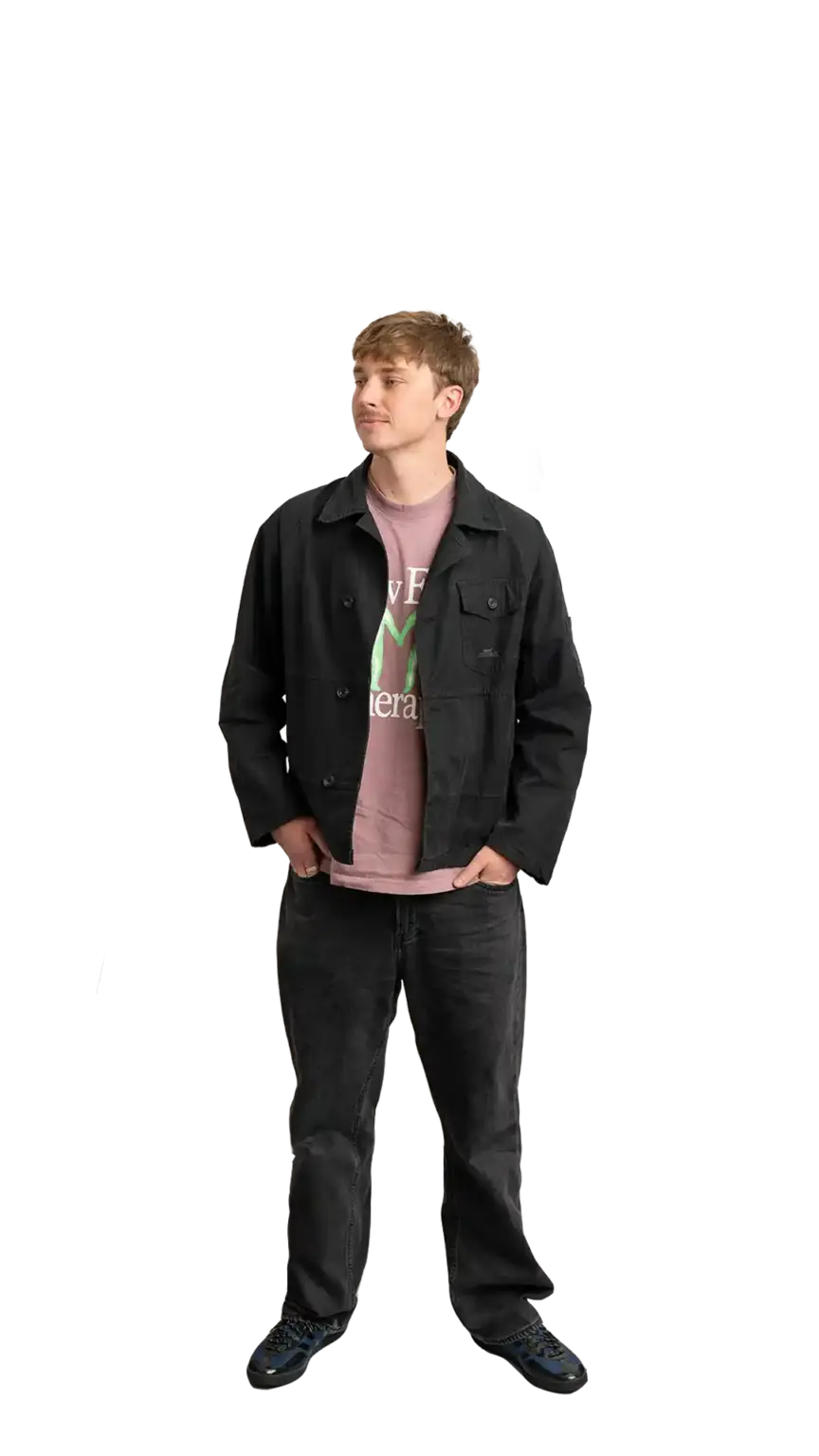 Adam Langridge, Marketing Specialist at The Start, full-body portrait — looking to the left