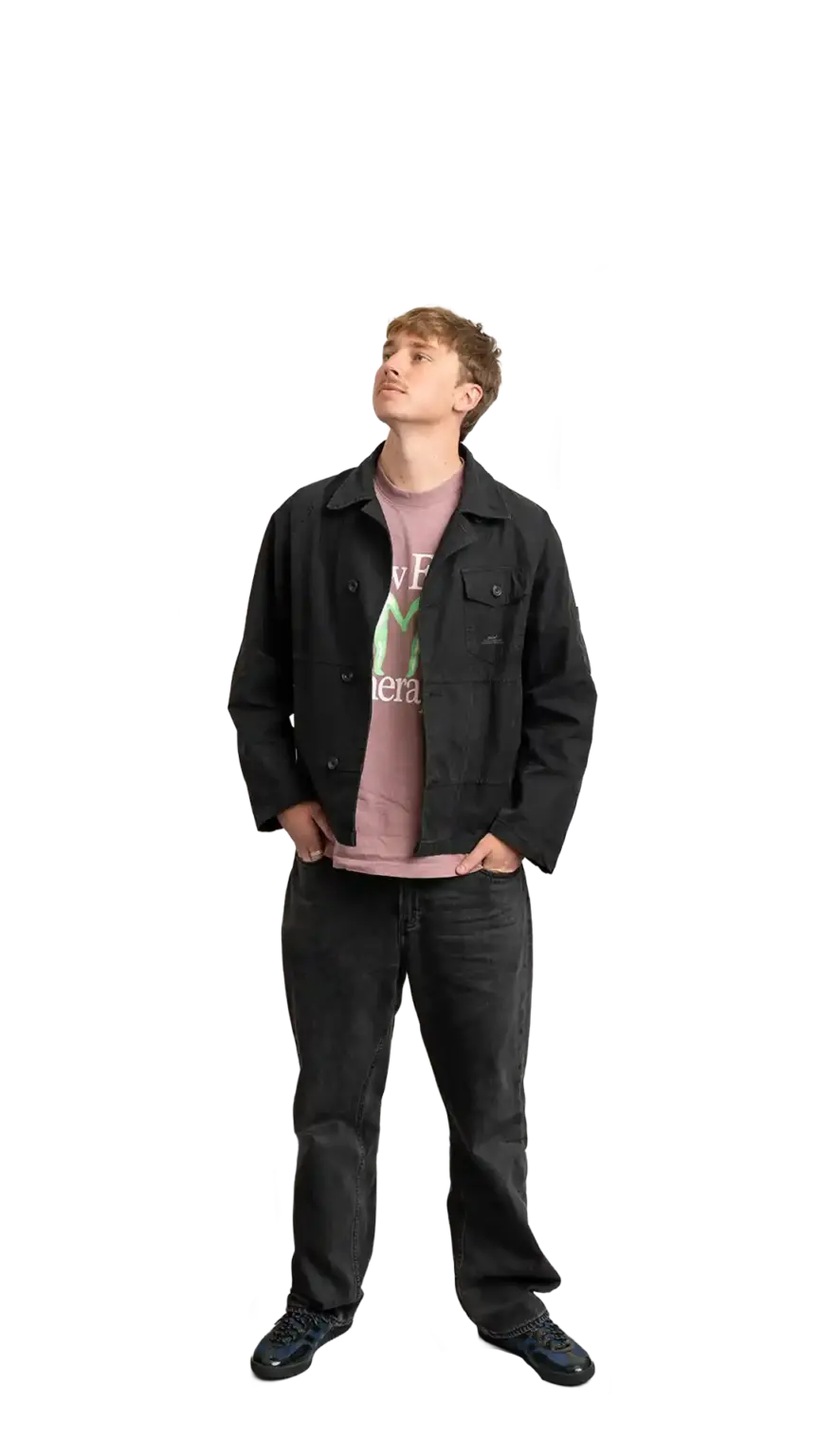 Adam Langridge, Marketing Specialist at The Start, full-body portrait — looking up and to the left