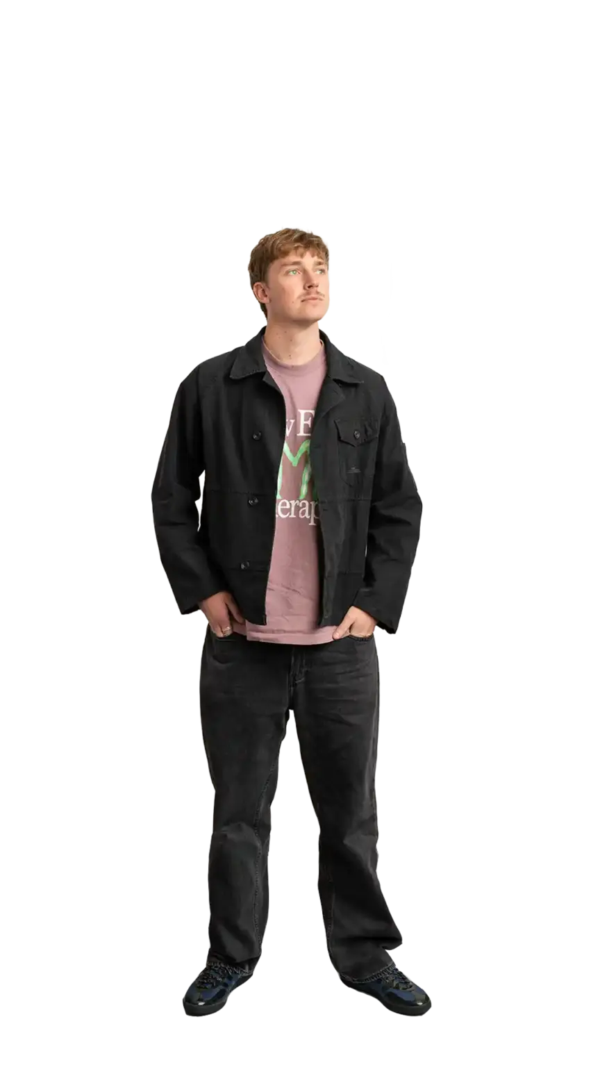 Adam Langridge, Marketing Specialist at The Start, full-body portrait — looking up and to the right