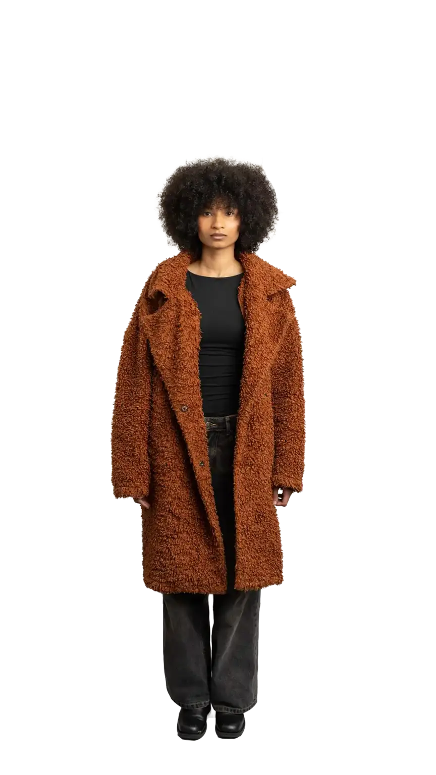Aisha Runowanda, Creative Designer at The Start, full-body portrait — looking straight ahead