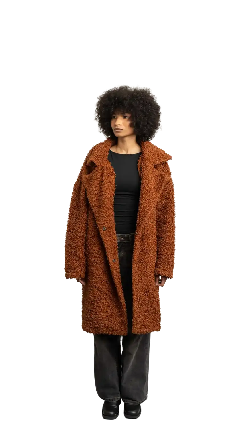 Aisha Runowanda, Creative Designer at The Start, full-body portrait — looking to the left