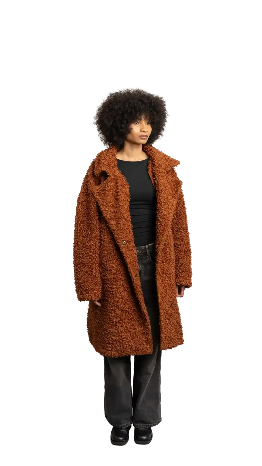 Aisha Runowanda, Creative Designer at The Start, full-body portrait — looking to the right