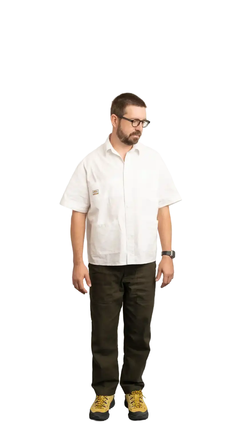 Clinton Sutherland, Creative Director at The Start, full-body portrait — looking down and to the right