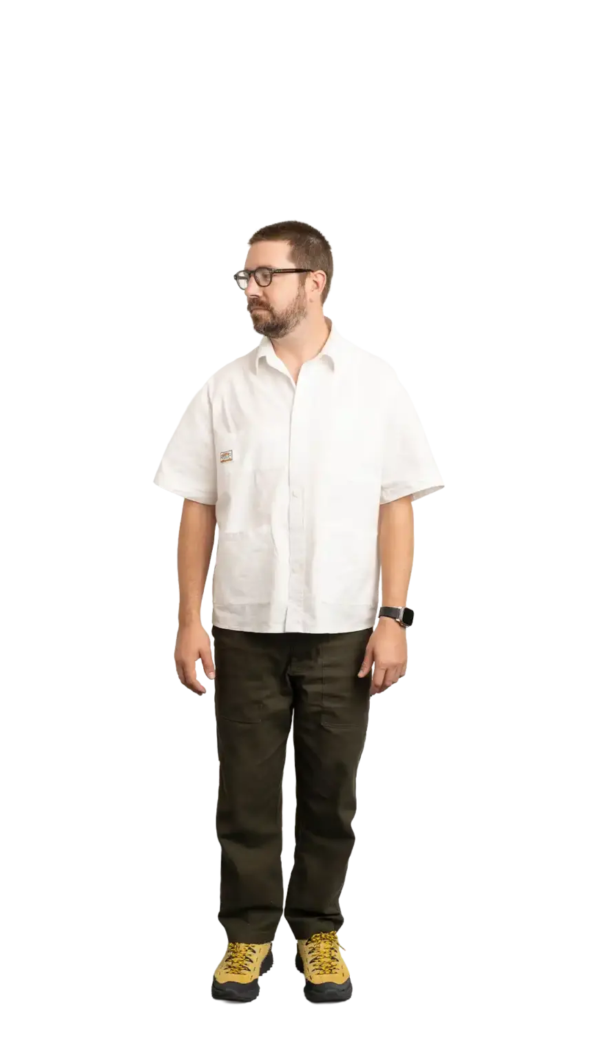 Clinton Sutherland, Creative Director at The Start, full-body portrait — looking to the left