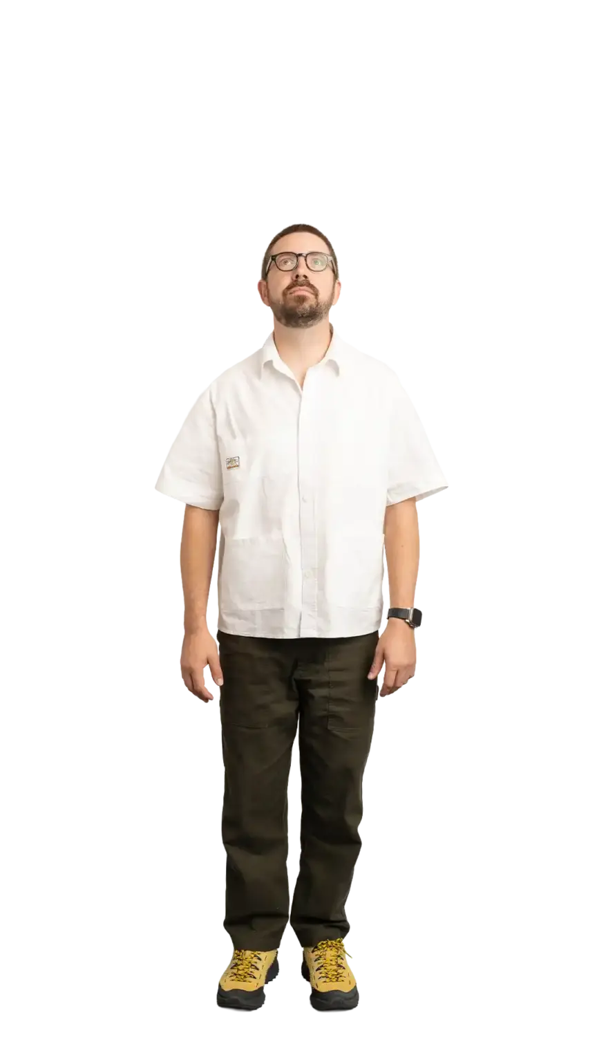 Clinton Sutherland, Creative Director at The Start, full-body portrait — looking straight up