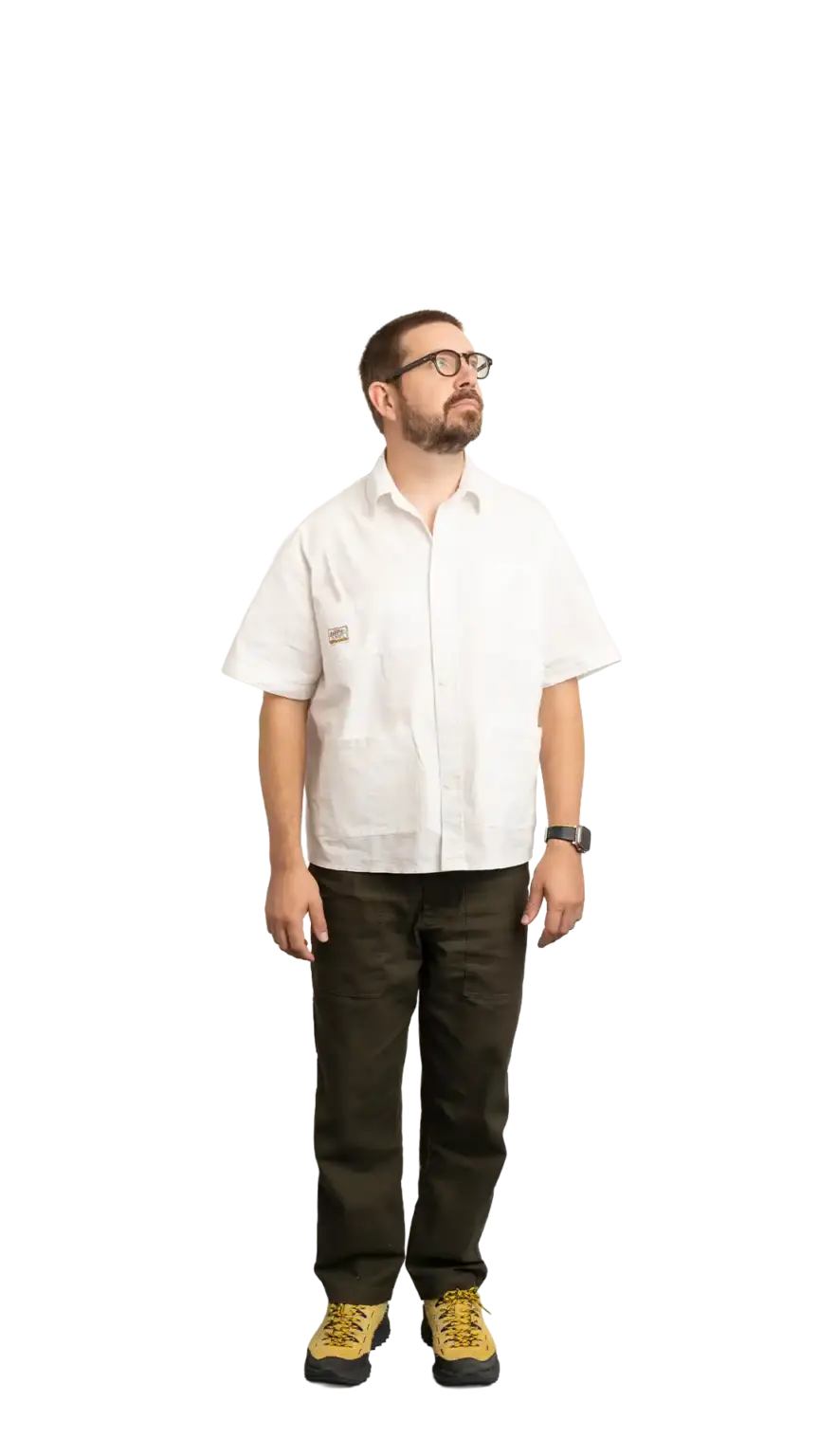 Clinton Sutherland, Creative Director at The Start, full-body portrait — looking up and to the right