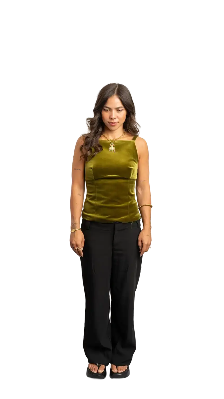 Crissy Foster, General Manager at The Start, full-body portrait — looking straight down