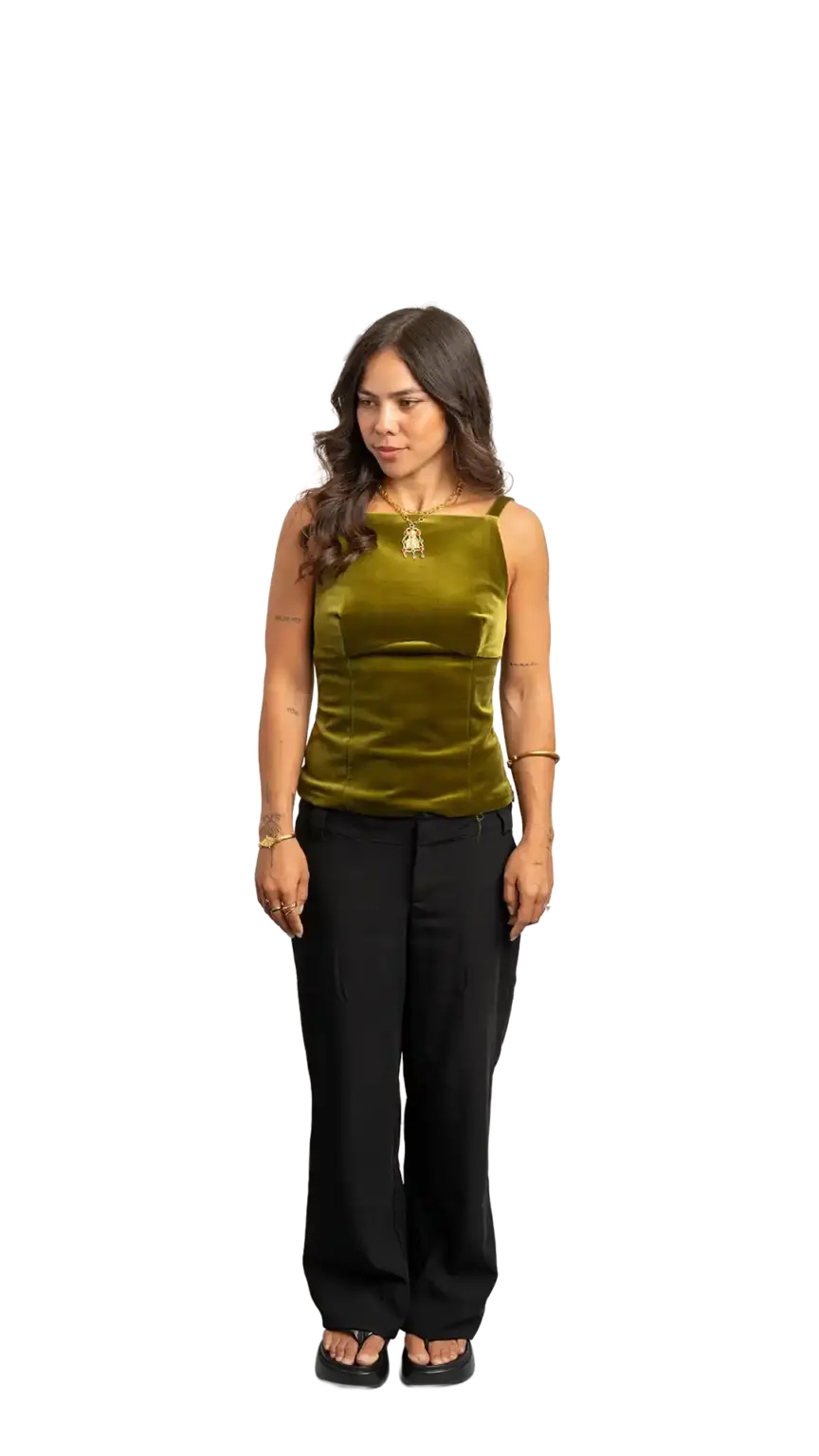 Crissy Foster, General Manager at The Start, full-body portrait — looking down and to the left
