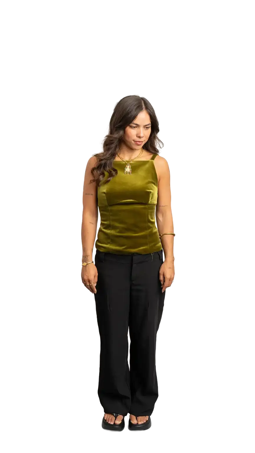 Crissy Foster, General Manager at The Start, full-body portrait — looking down and to the right