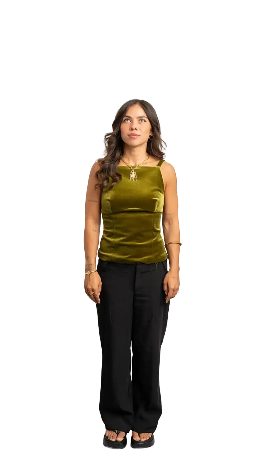 Crissy Foster, General Manager at The Start, full-body portrait — looking straight up
