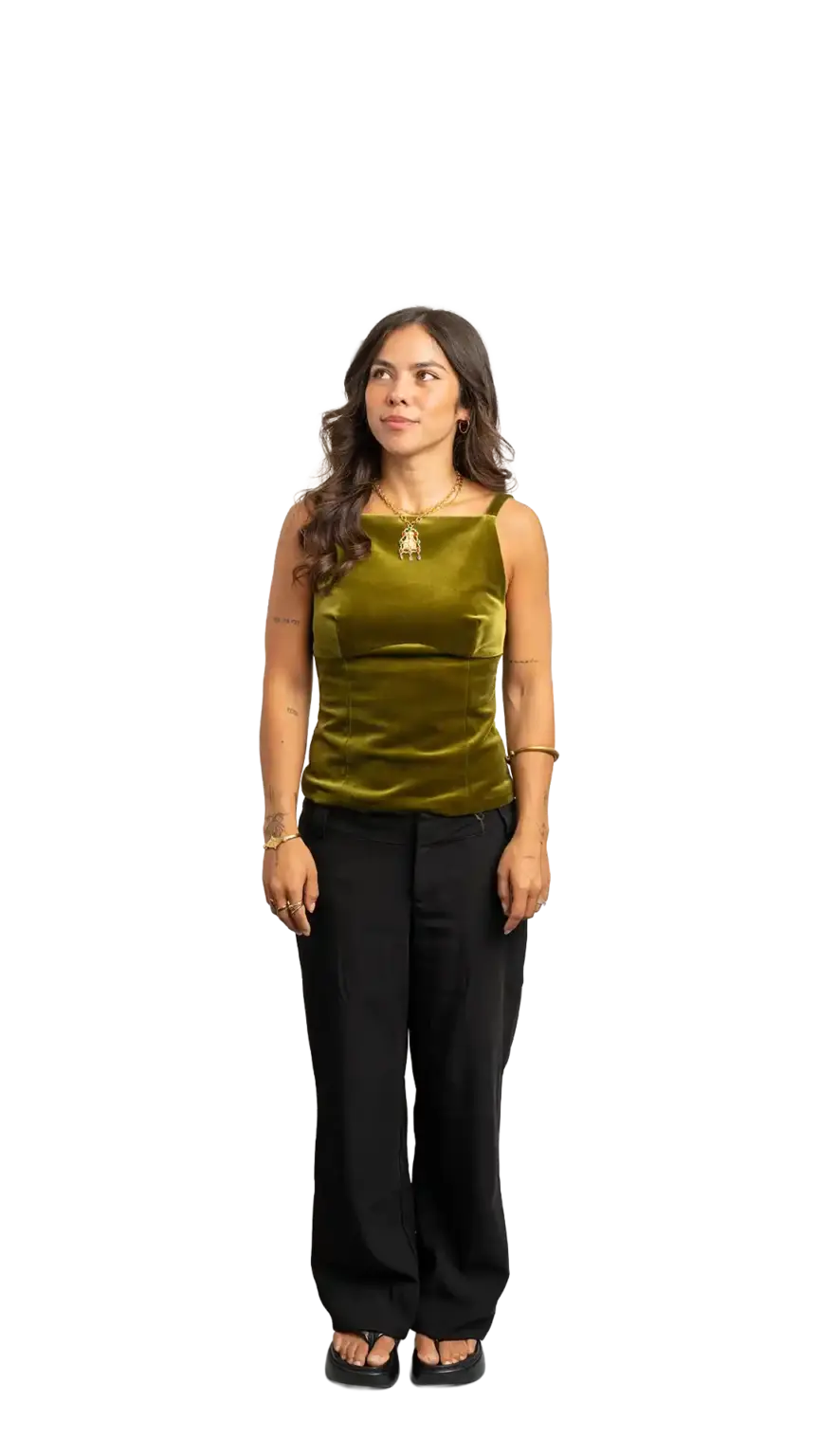 Crissy Foster, General Manager at The Start, full-body portrait — looking up and to the left