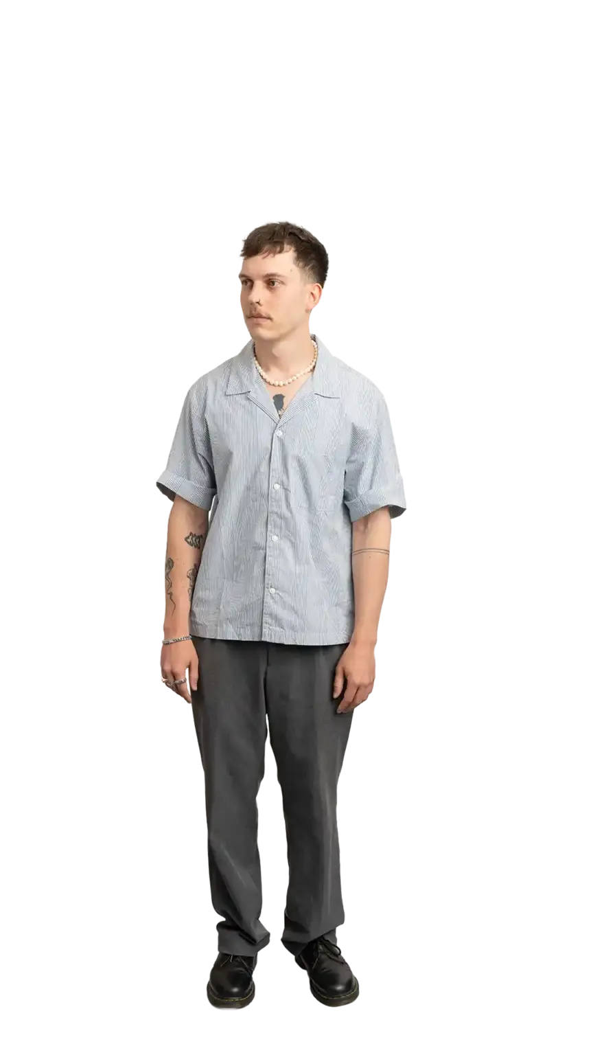 Cullen Webber, Technical Lead at The Start, full-body portrait — looking to the left