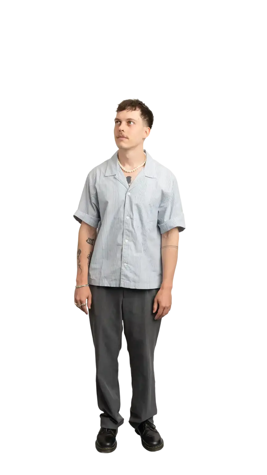 Cullen Webber, Technical Lead at The Start, full-body portrait — looking up and to the left