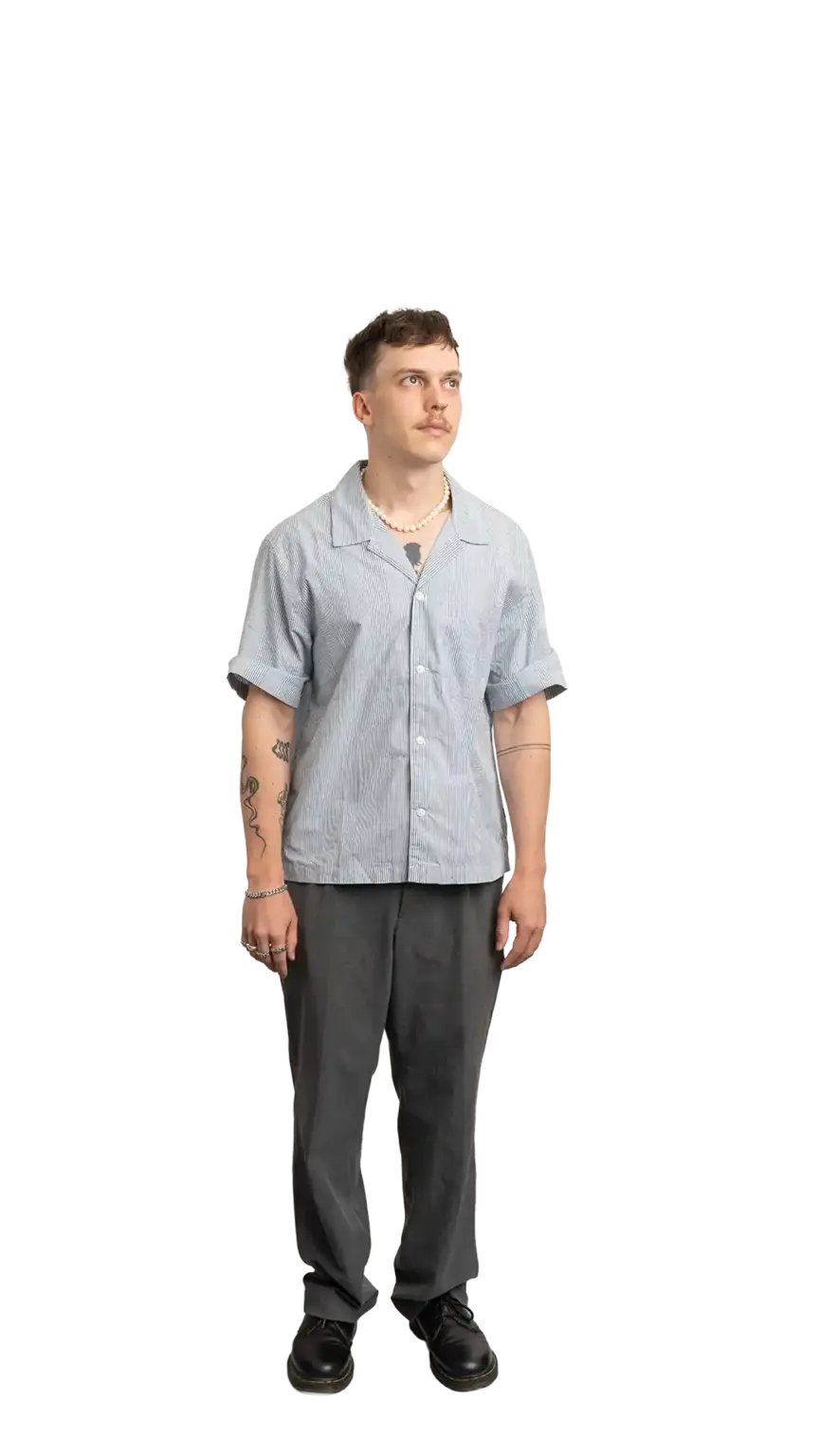 Cullen Webber, Technical Lead at The Start, full-body portrait — looking up and to the right
