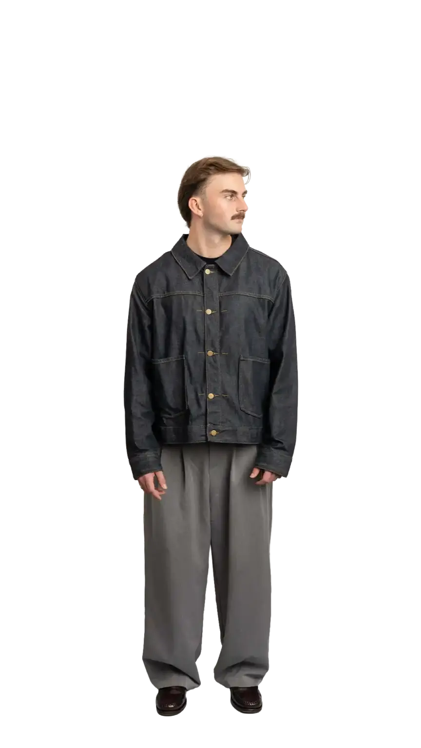 Fin Mason, Operations Manager at The Start, full-body portrait — looking to the right