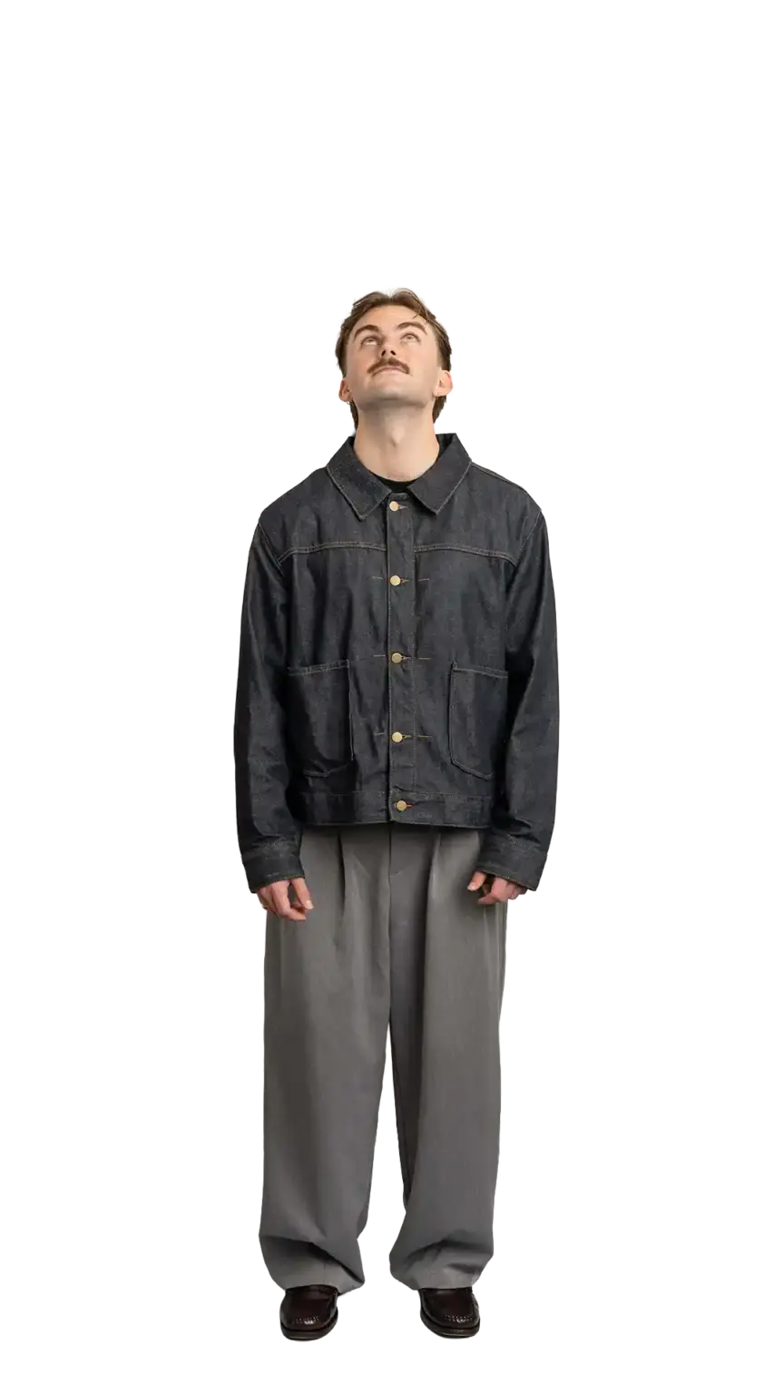 Fin Mason, Operations Manager at The Start, full-body portrait — looking straight up