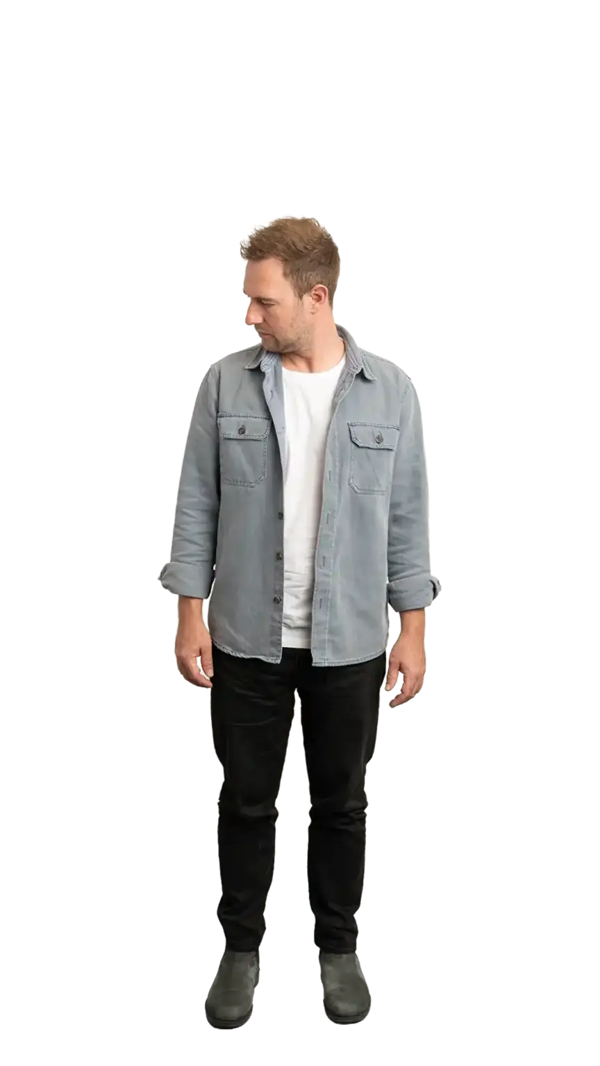 Ian Hollinshead, Client Services Manager at The Start, full-body portrait — looking down and to the left