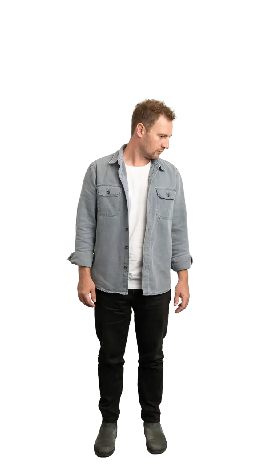 Ian Hollinshead, Client Services Manager at The Start, full-body portrait — looking down and to the right
