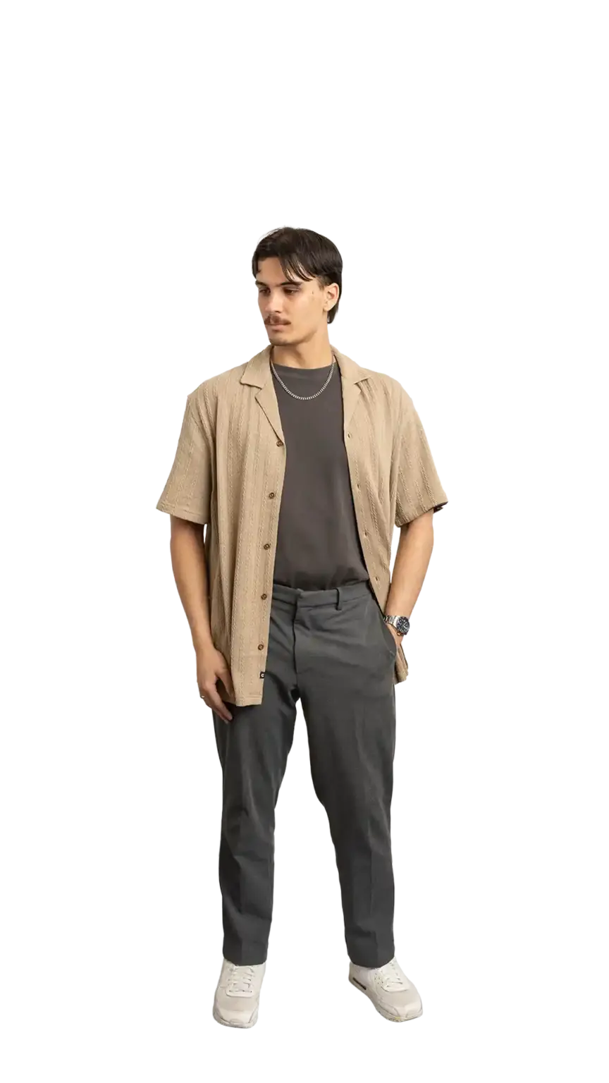 James Kang, Creative Developer at The Start, full-body portrait — looking down and to the left