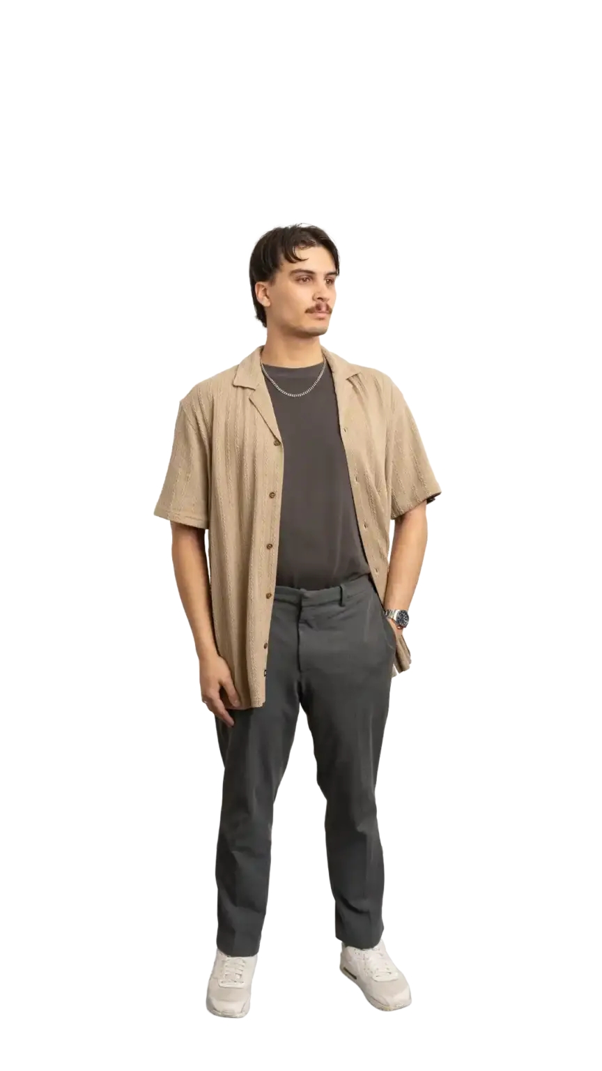 James Kang, Creative Developer at The Start, full-body portrait — looking to the right