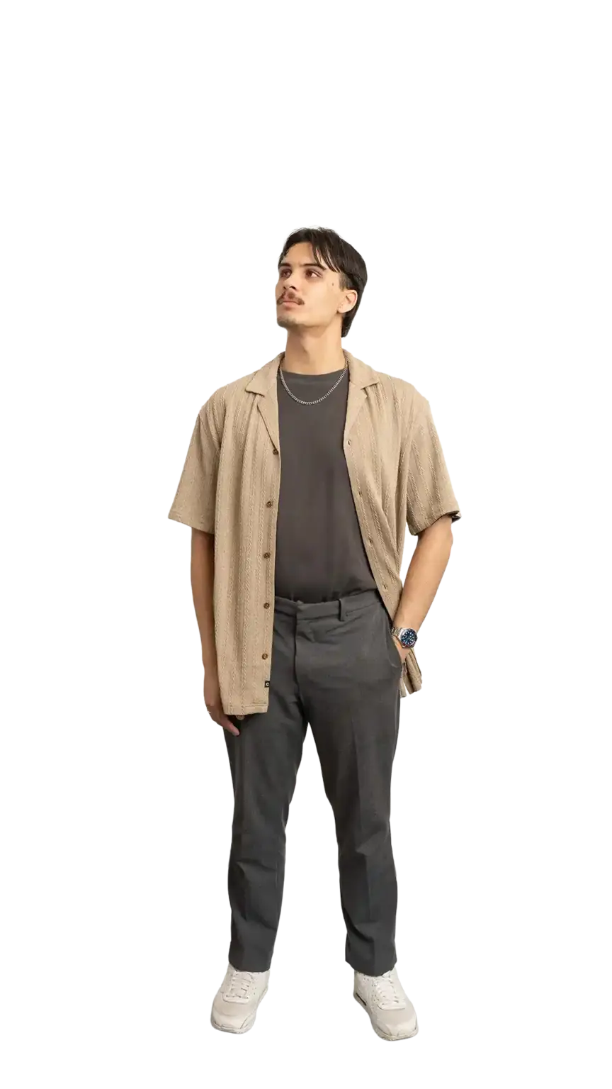James Kang, Creative Developer at The Start, full-body portrait — looking up and to the left