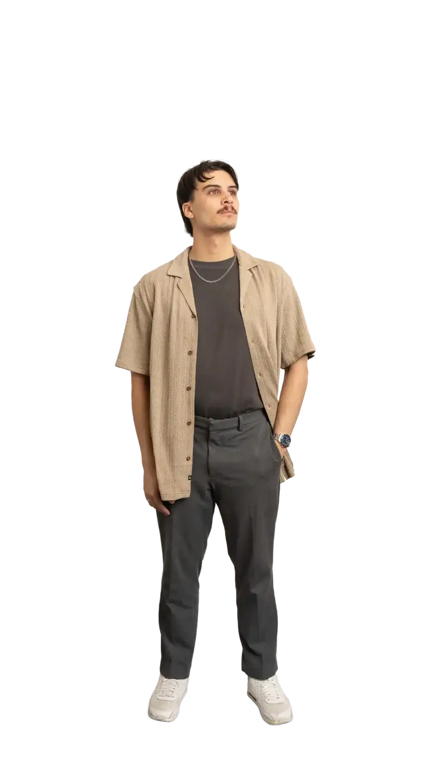 James Kang, Creative Developer at The Start, full-body portrait — looking up and to the right