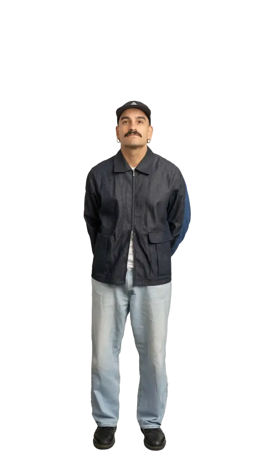 Jordan Nesic, Creative Designer at The Start, full-body portrait — looking straight up