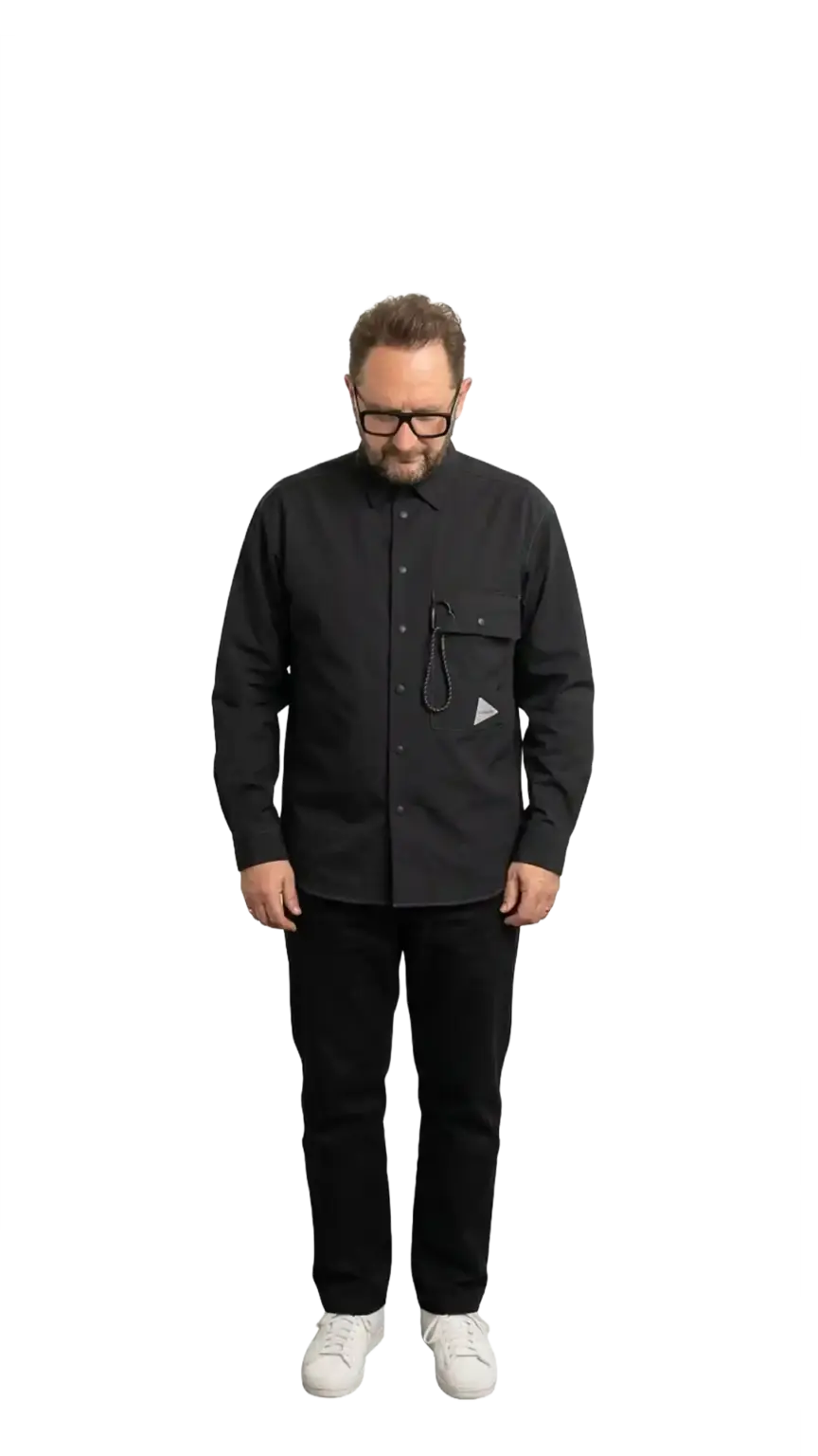 Neil Mason, Managing Director at The Start, full-body portrait — looking downward at centre
