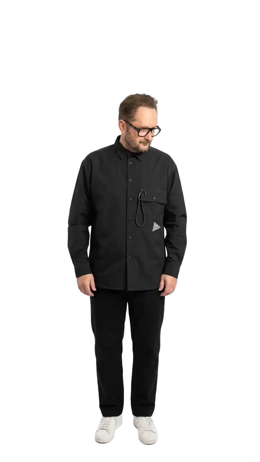 Neil Mason, Managing Director at The Start, full-body portrait — looking down and to the left