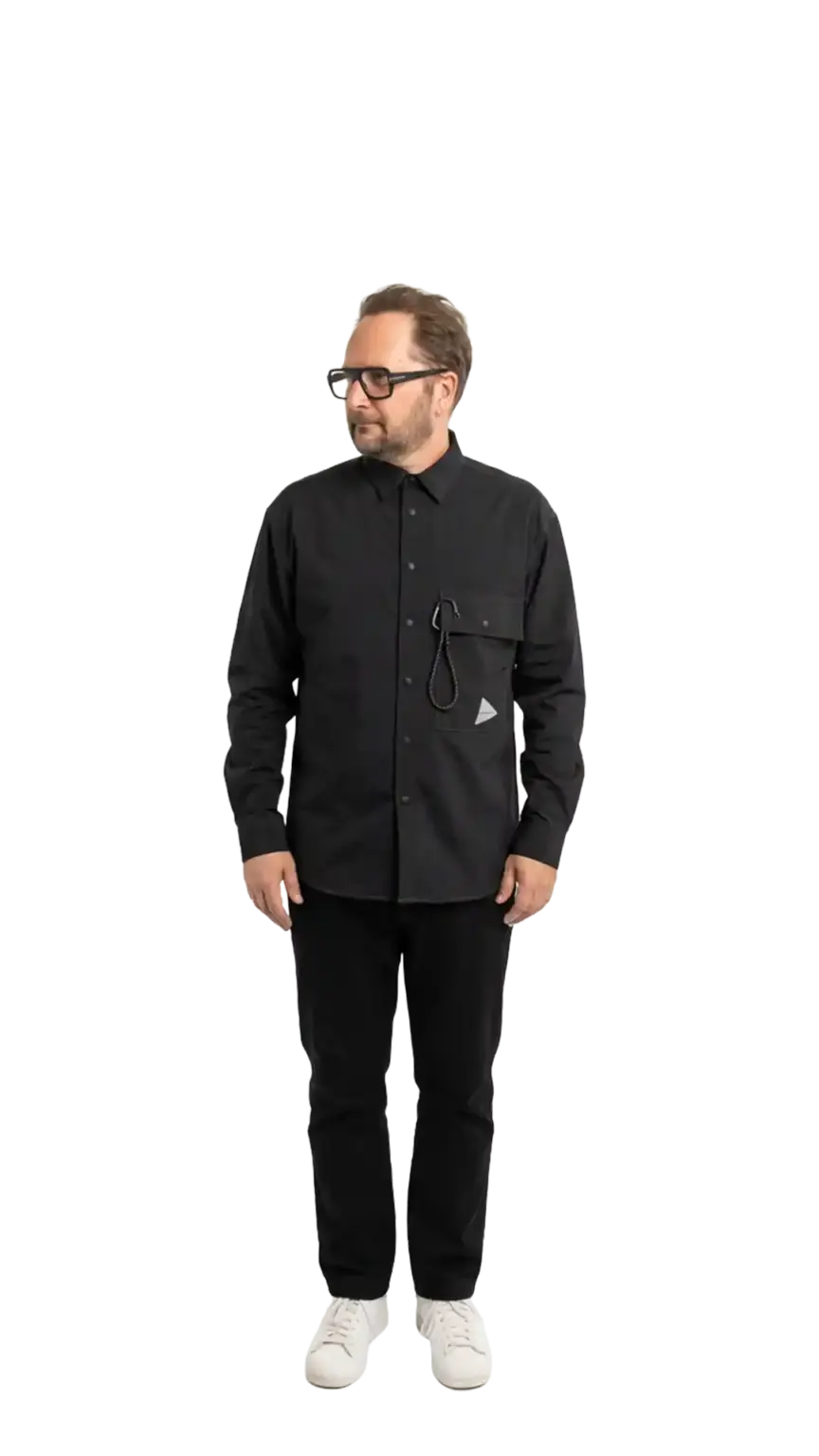 Neil Mason, Managing Director at The Start, full-body portrait — looking to the left