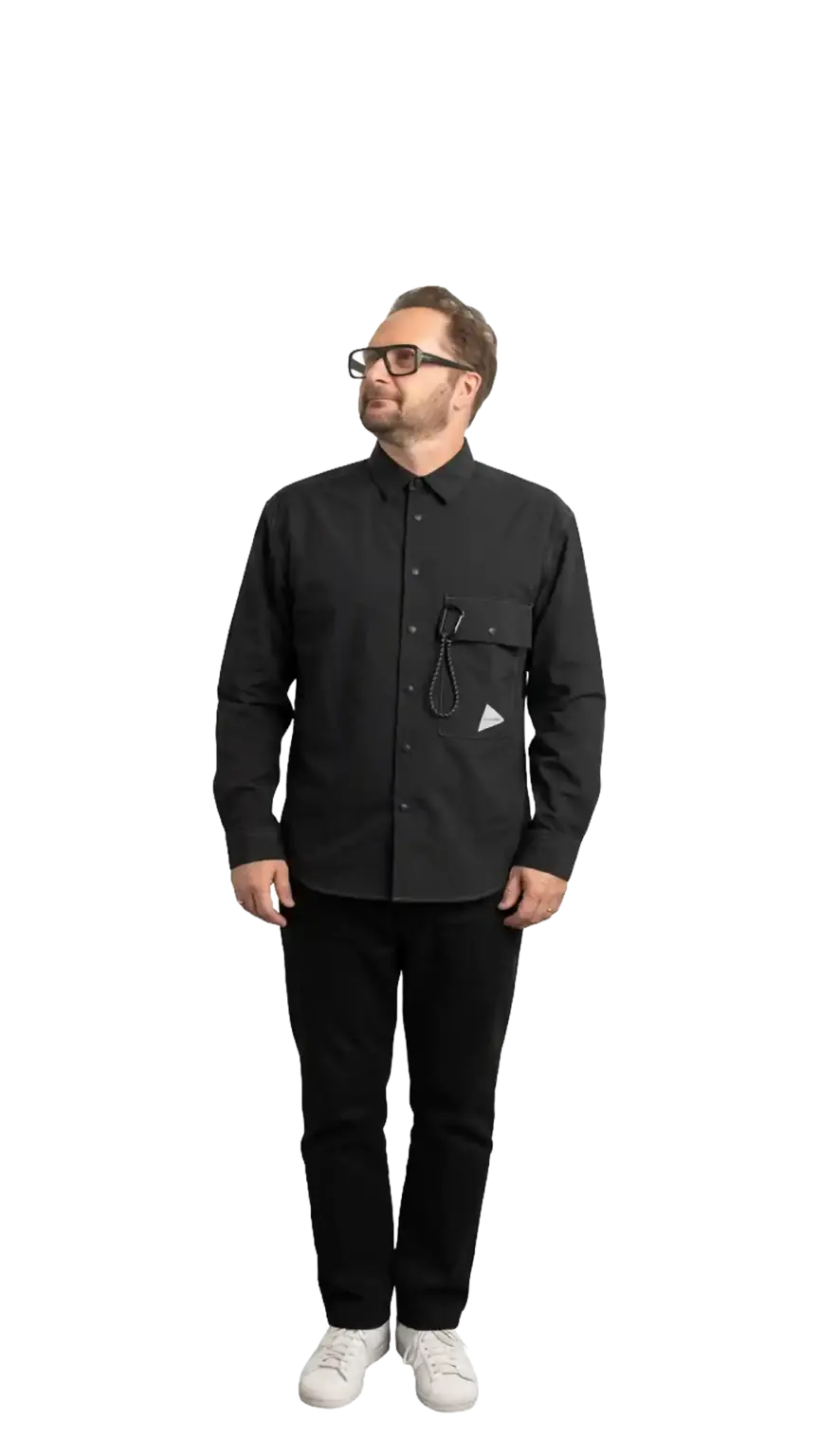 Neil Mason, Managing Director at The Start, full-body portrait — looking up and to the left