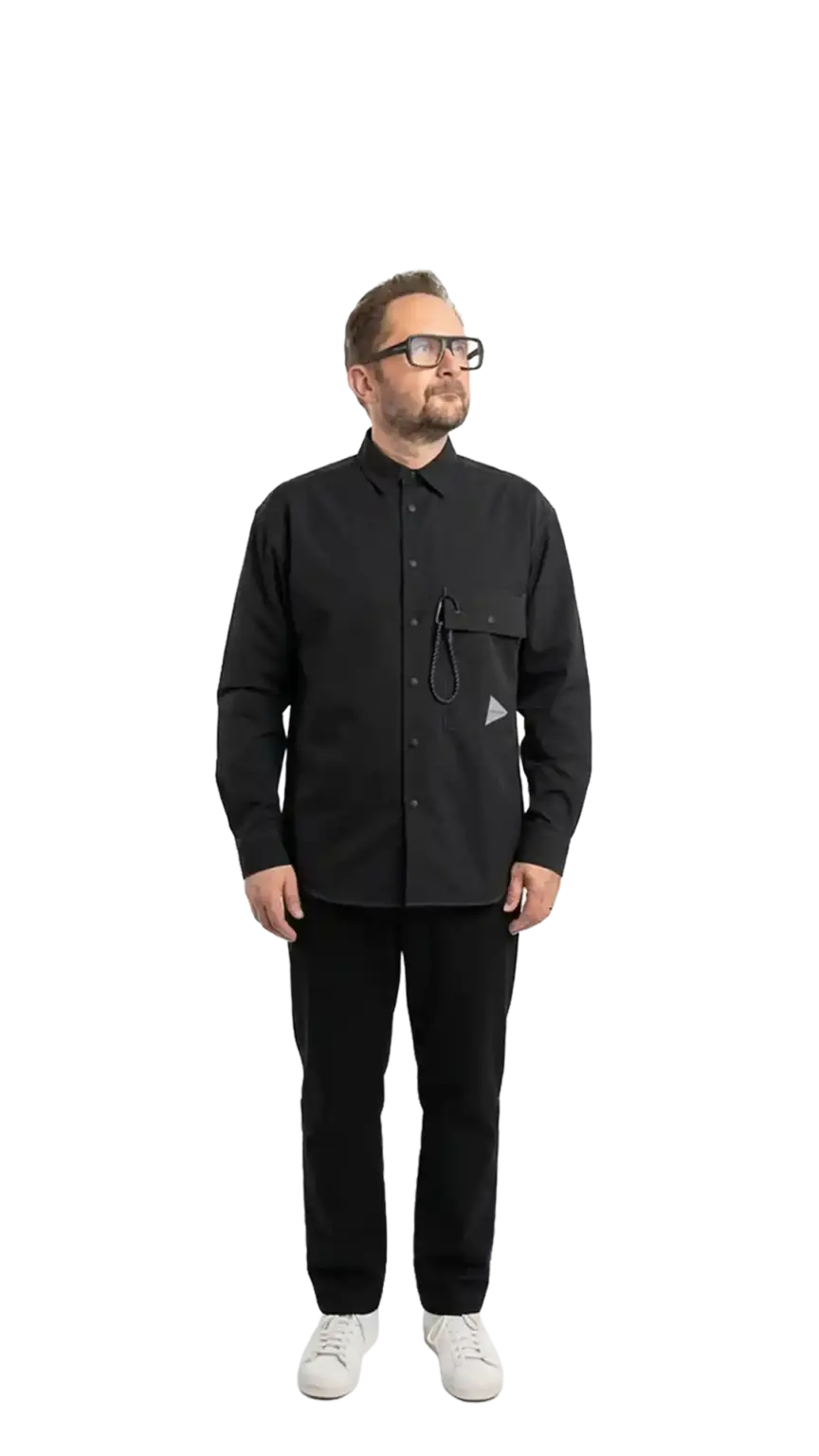 Neil Mason, Managing Director at The Start, full-body portrait — looking up and to the right