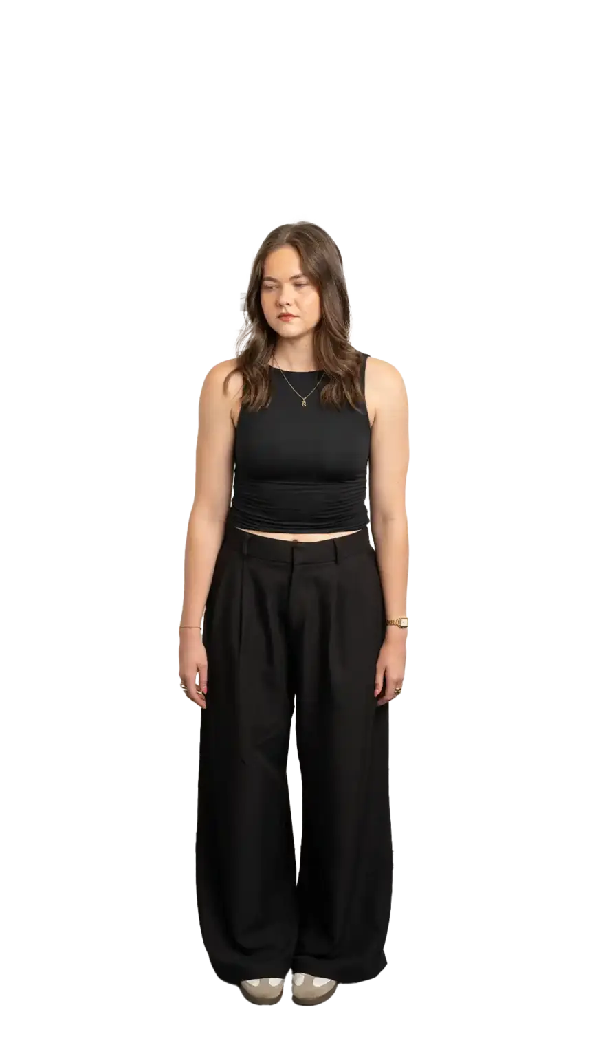 Rachel Clapp, Marketing Specialist at The Start, full-body portrait — looking down and to the left