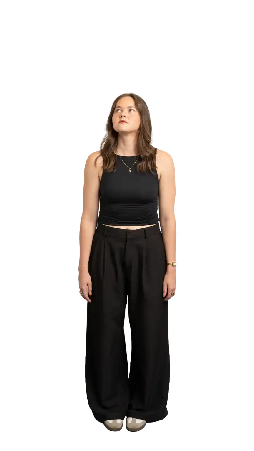 Rachel Clapp, Marketing Specialist at The Start, full-body portrait — looking up and to the left