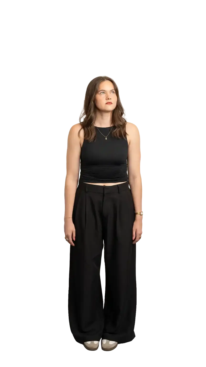 Rachel Clapp, Marketing Specialist at The Start, full-body portrait — looking up and to the right