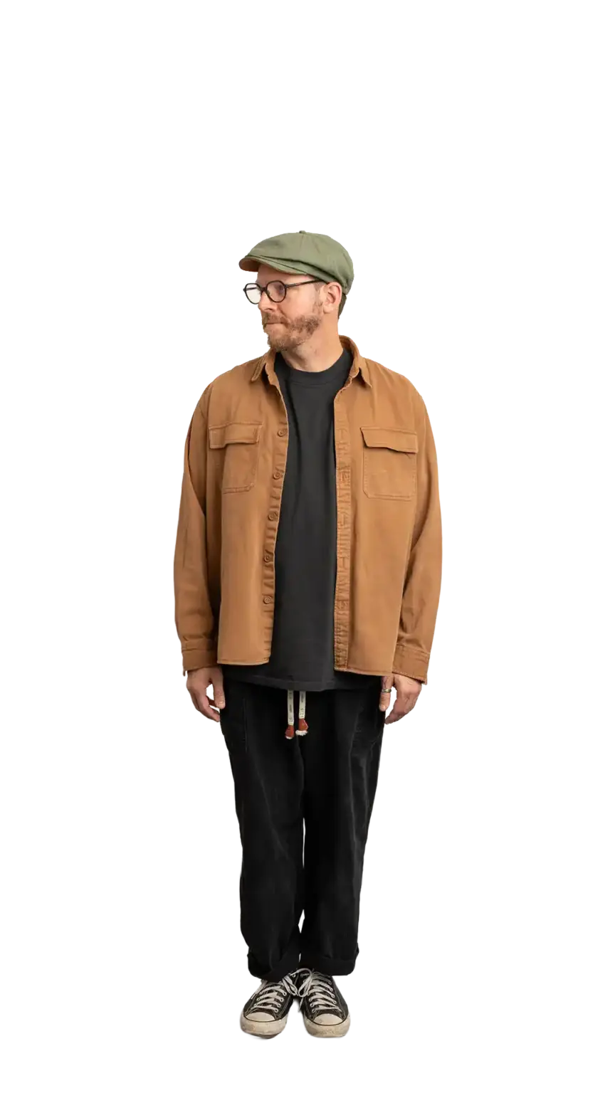 Travis Weerts, Head of Innovation at The Start, full-body portrait — looking to the left