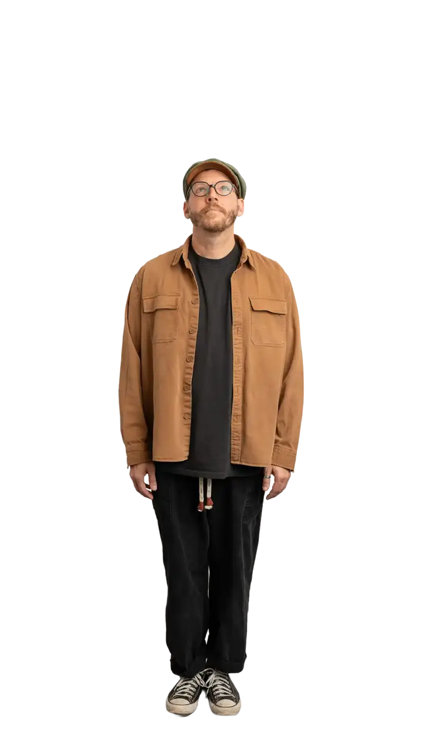 Travis Weerts, Head of Innovation at The Start, full-body portrait — looking straight up