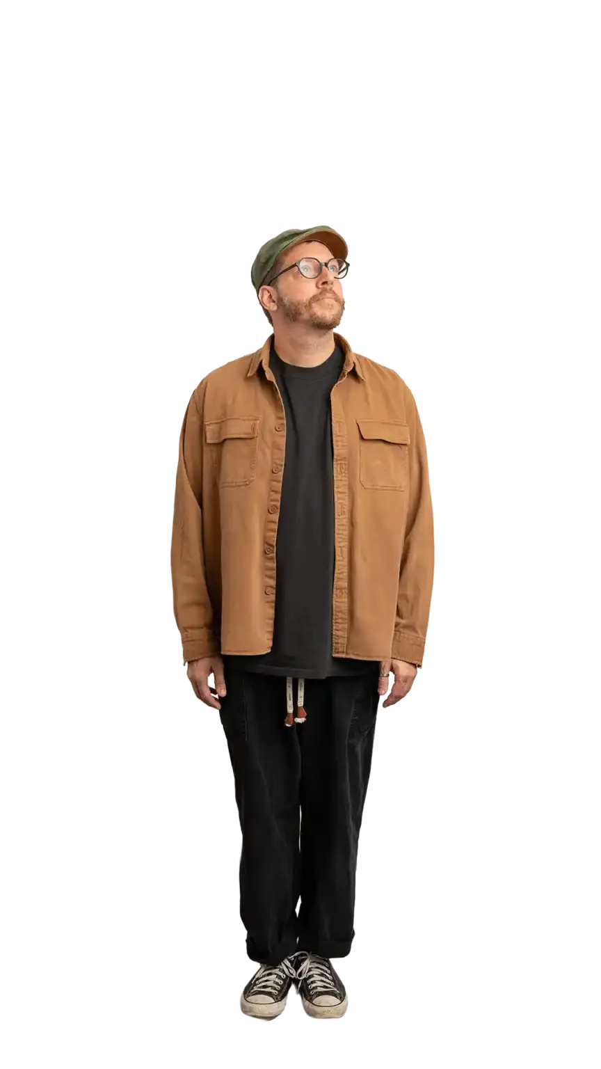 Travis Weerts, Head of Innovation at The Start, full-body portrait — looking up and to the right
