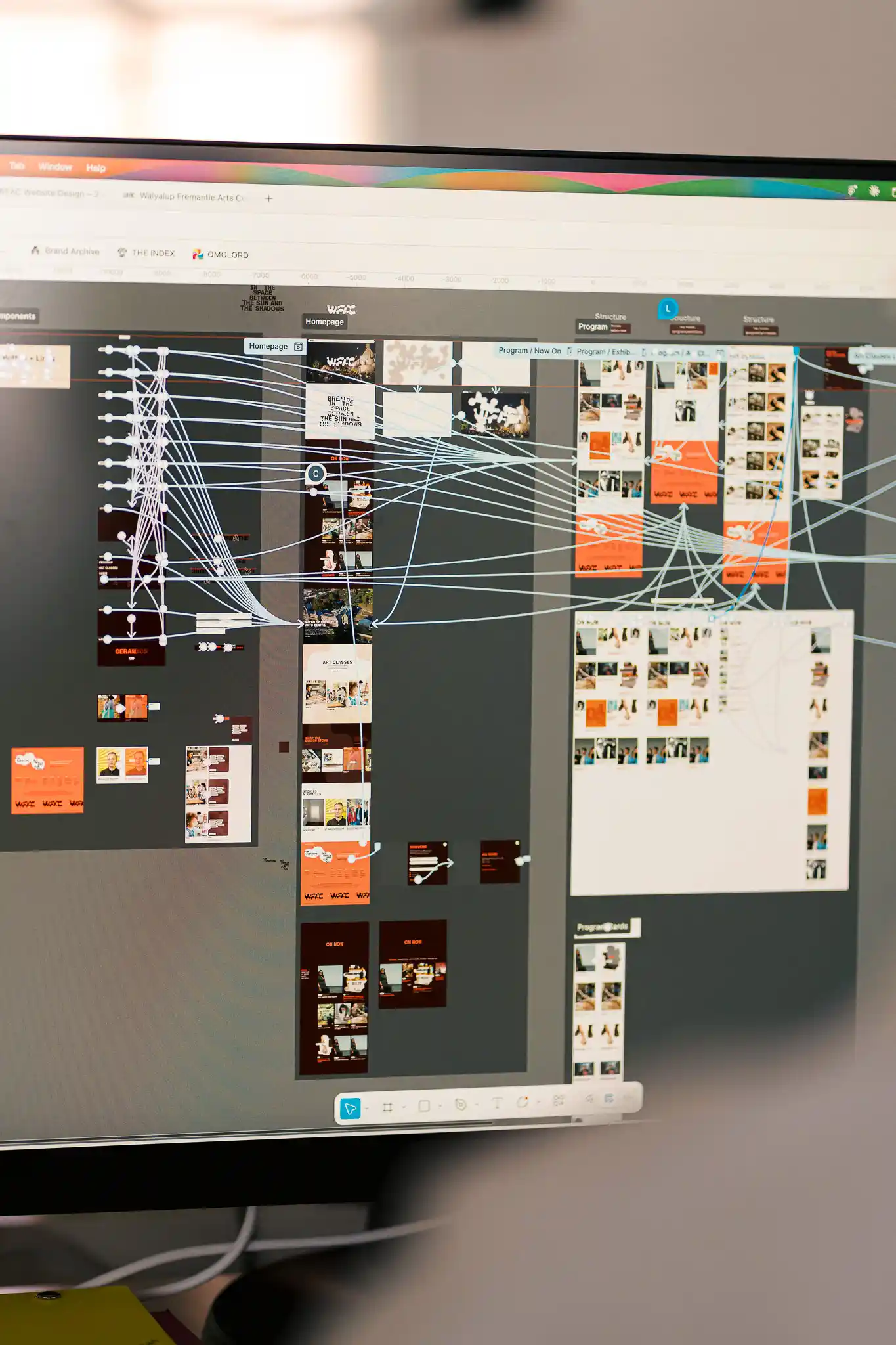 Close-up of computer screens showing colourful design work and digital portfolio projects at The Start
